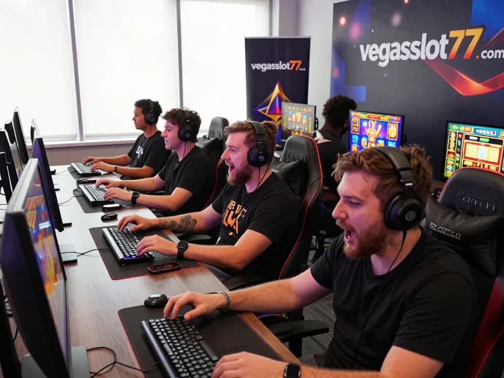 Players enjoying thrilling gaming experience at vegasslot77.com with colorful screens and lively atmosphere.